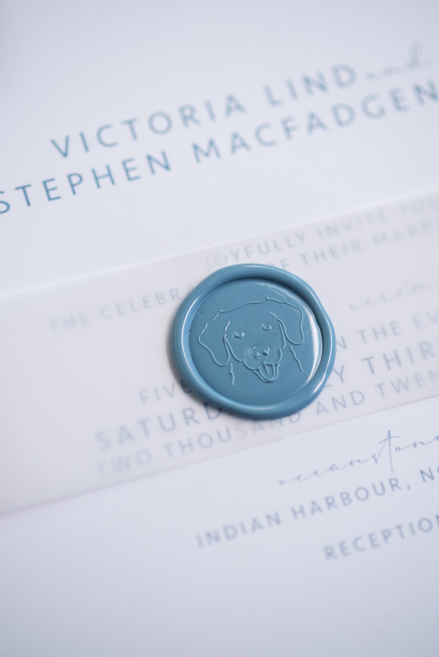 Custom pet wax seal stamp on a wedding invitation