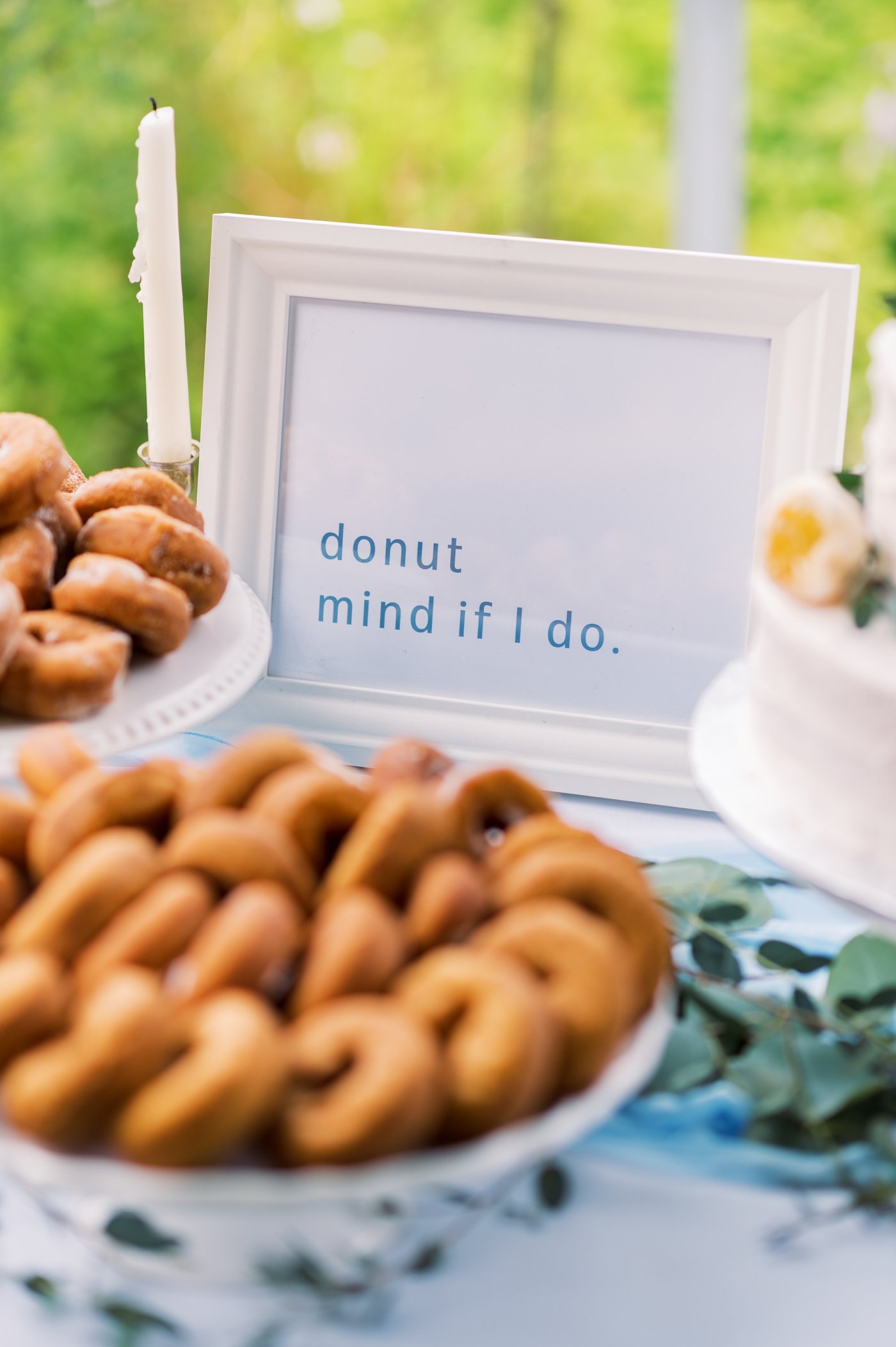 "Donut mind if I do" wedding dessert table sign