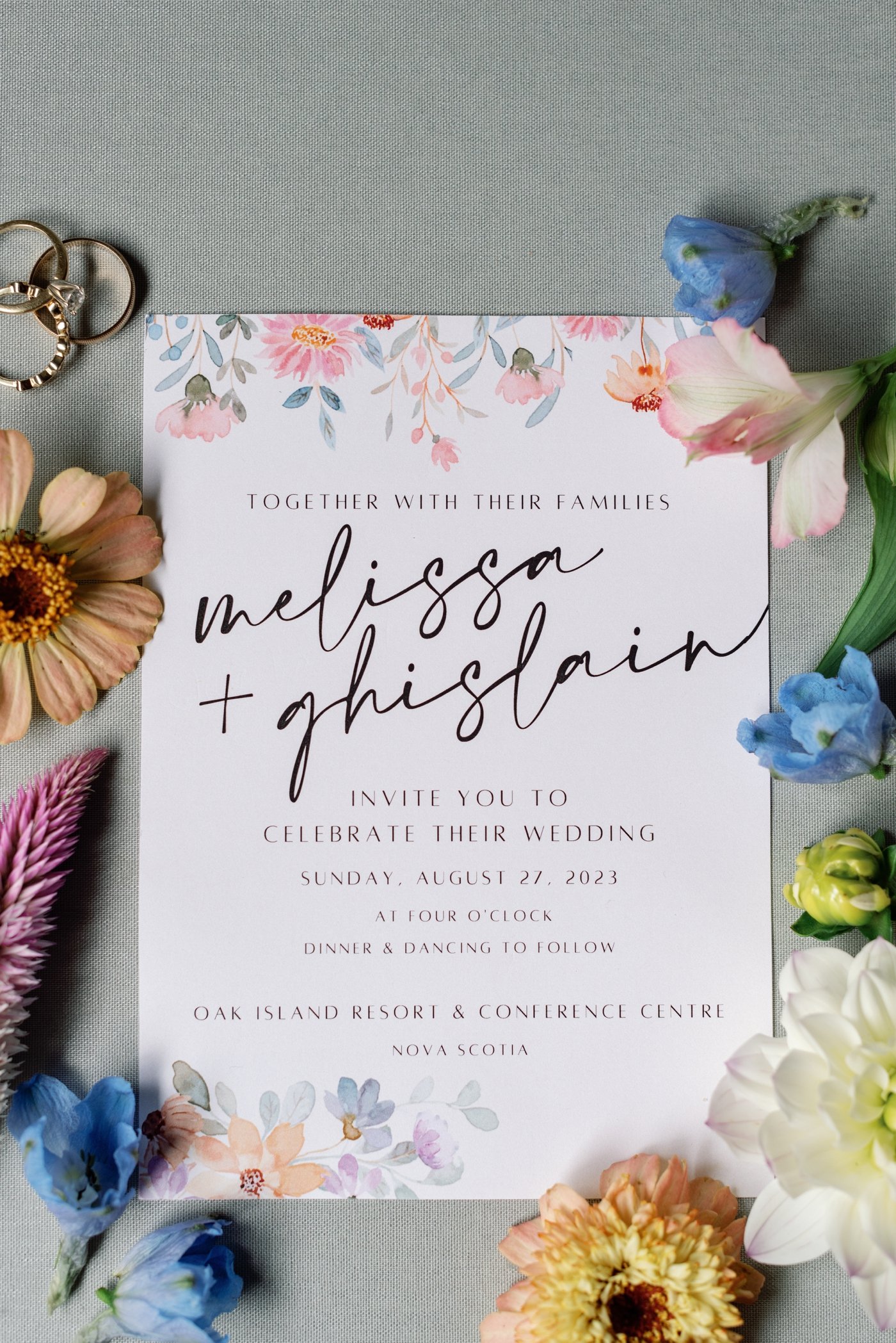 Summer wedding invitation with colorful watercolor flowers